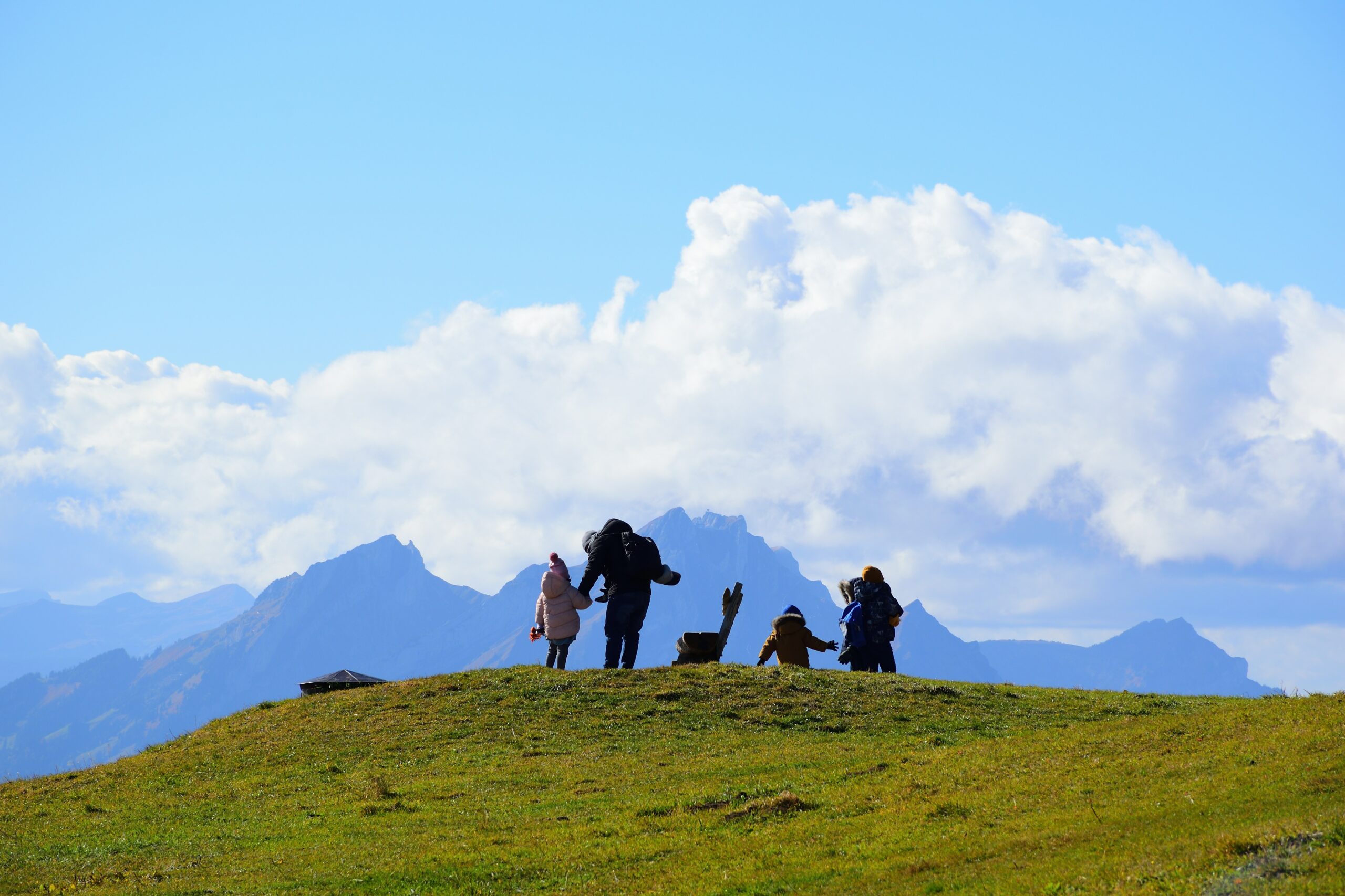 Family traveling together in an airport setting