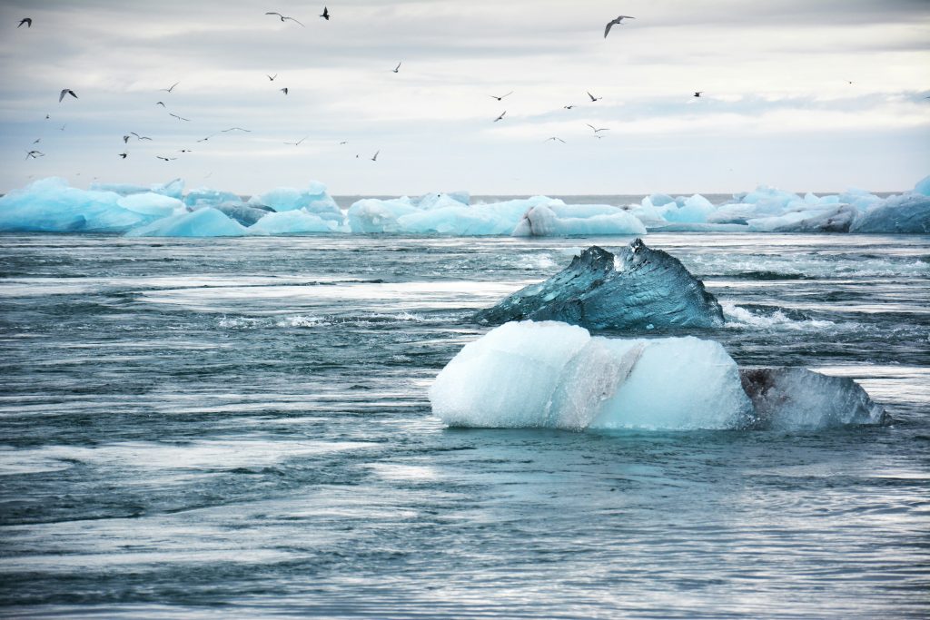 Vatnajökull glacier with deep blue ice crevasses reflecting ancient layers